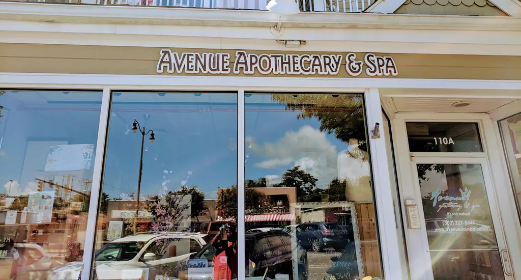 The Avenue Apothecary & Spa sign above the 110A door